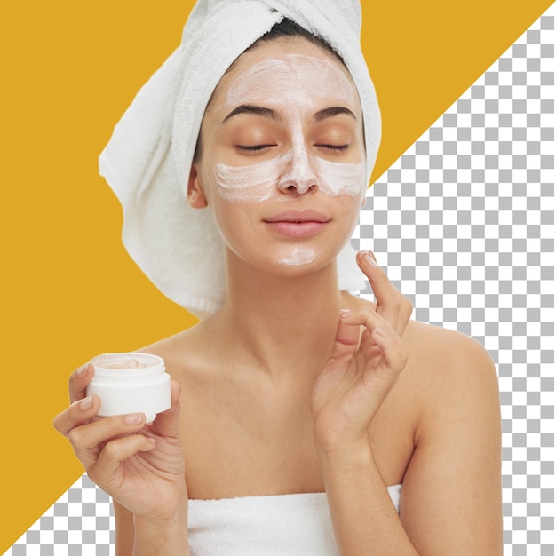 Woman applying face mask for skincare