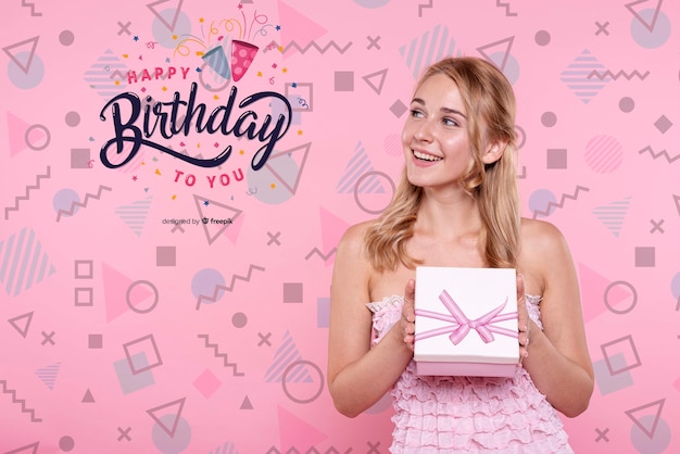 Woman holding birthday box