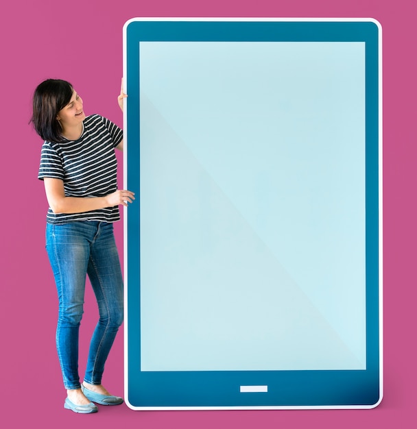 PSD woman holding a blue tablet mockup
