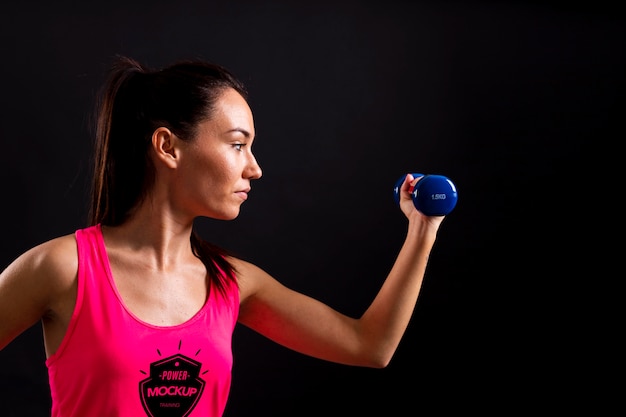 PSD woman holding dumbbells mock-up