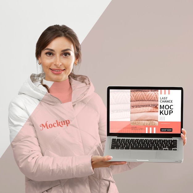 woman holding laptop medium shot