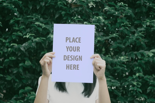 Woman Holding Purple Paper PSD Mockup