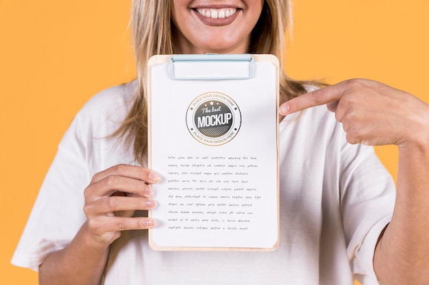 Woman holding sign mock-up