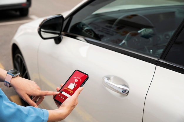 Woman holding a smartphone with a home automation app