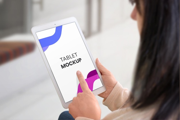 Woman holding tablet mockup and touch display