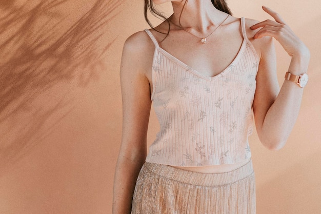 Woman in a light pink tank top mockup