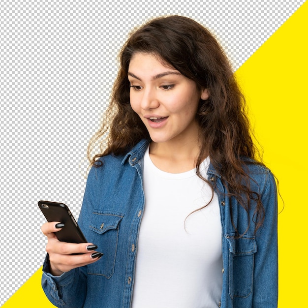 woman looking surprised at her smartphone