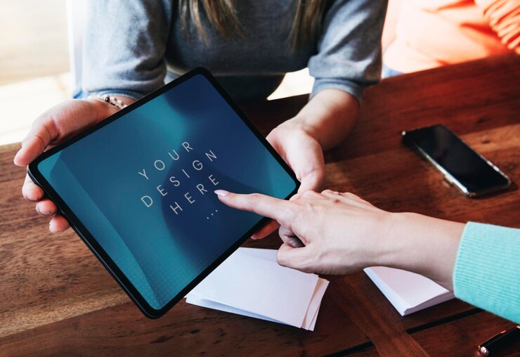 PSD woman pointing on a digital tablet screen mockup