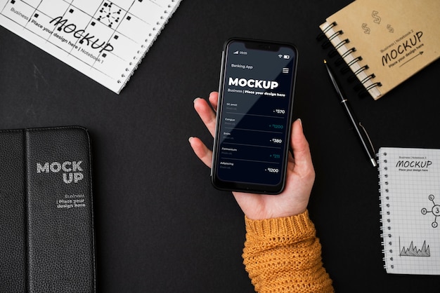 woman's hand holding phone mock-up