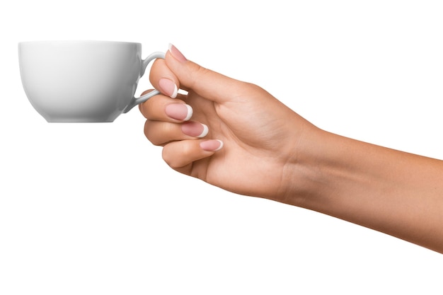 PSD a woman's hand holds a white cup on isolated transparent background