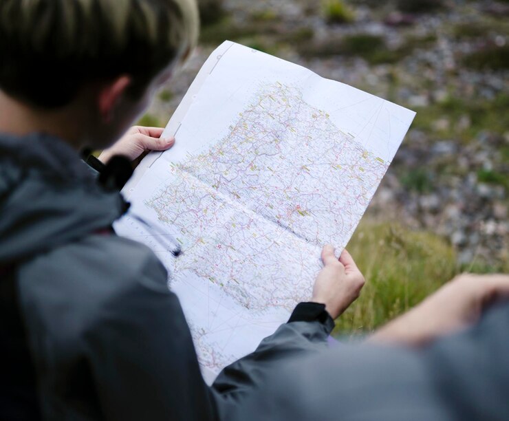 PSD woman searching for her location on a map