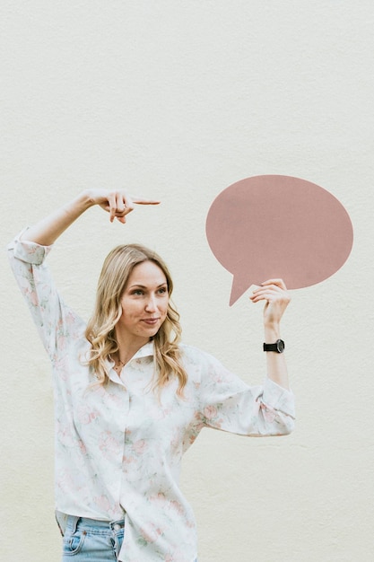 PSD woman showing a blank speech bubble