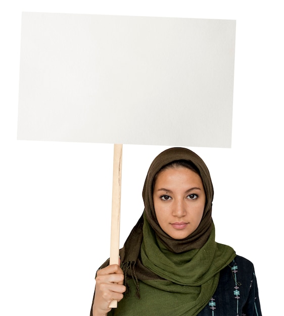 Woman standing and holding banner copyspace