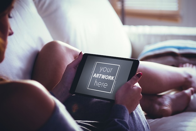 Woman using digital tablet