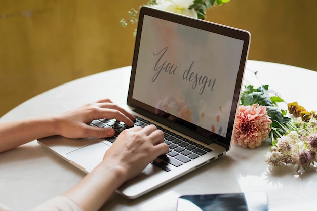 PSD woman using a laptop mockup