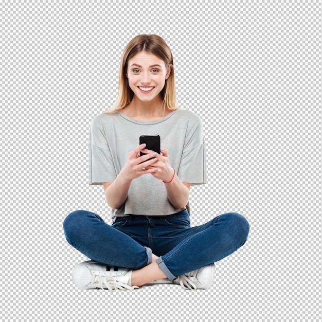 Woman using smartphone and sitting on floor