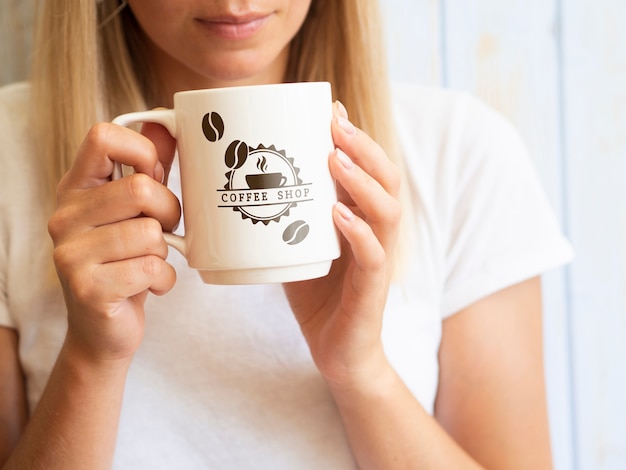 PSD woman wanting to drink from a coffee mug