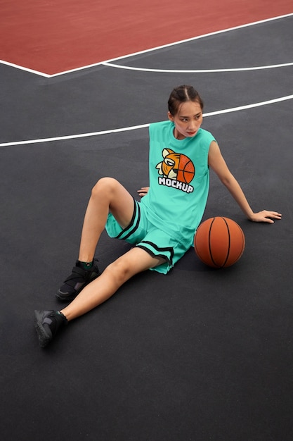 PSD woman wearing basketball jersey mockup