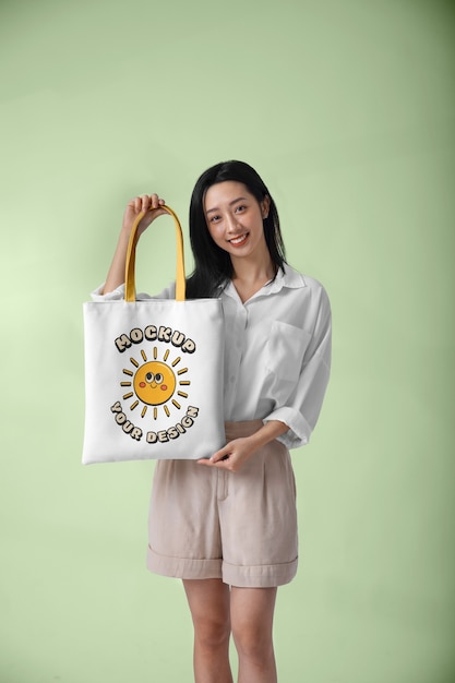 PSD woman wearing beach bag mockup