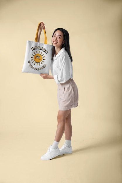 Woman wearing beach bag mockup