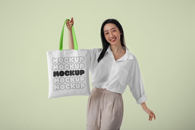 PSD woman wearing beach bag mockup