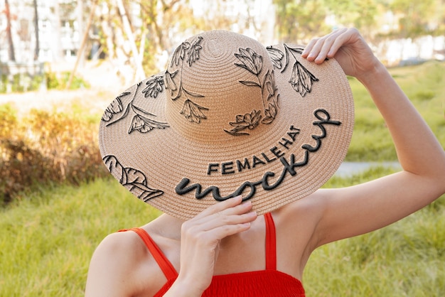 PSD woman wearing hat mockup