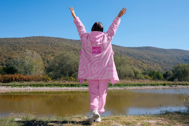 PSD woman wearing hoodie mockup for cold exposure