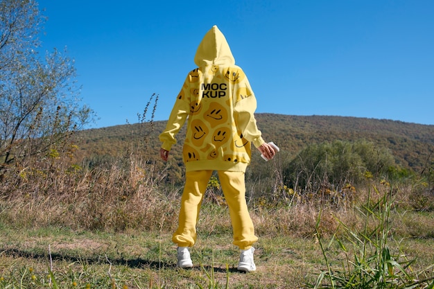 PSD woman wearing hoodie mockup for cold exposure