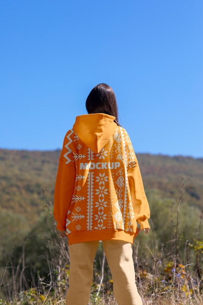 Woman wearing hoodie mockup for cold exposure