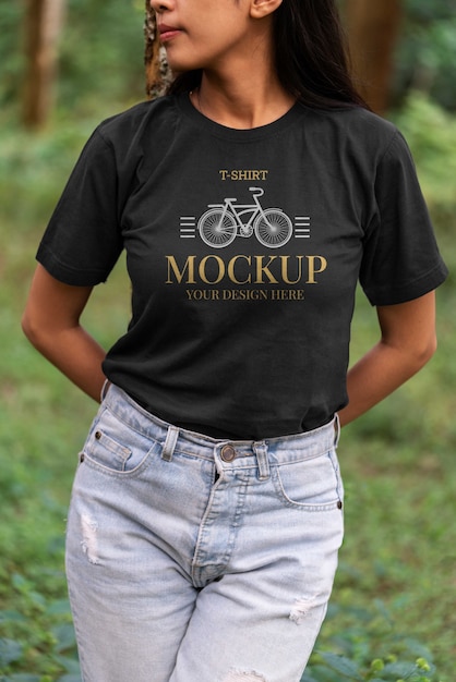 PSD woman wearing shirt mock-up outdoors in nature