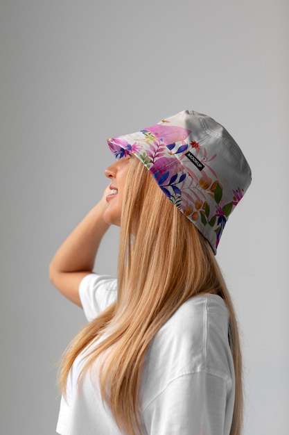 PSD woman wearing stylish bucket hat mock-up design