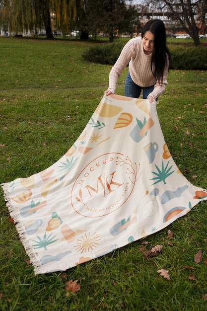 PSD woman with blanket in nature