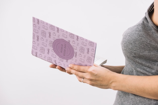 Woman with book mockup