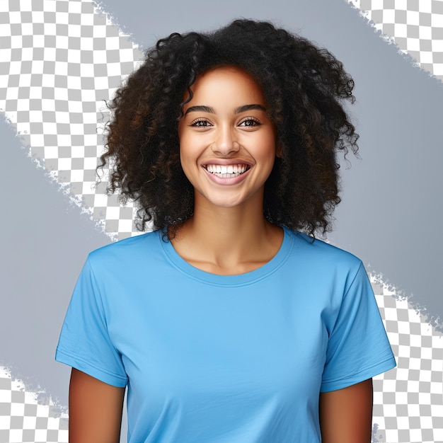 A woman with curly hair wearing a blue shirt with a white logo behind her neck.