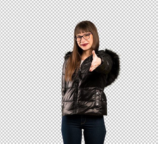 Woman with glasses shaking hands for closing a good deal