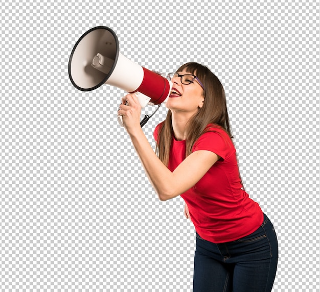 Woman with glasses shouting through a megaphone