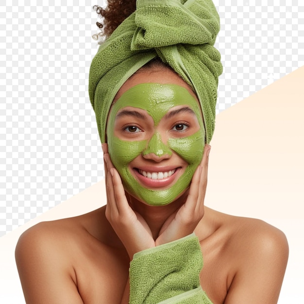 a woman with a green mask on her face with a green towel on her head
