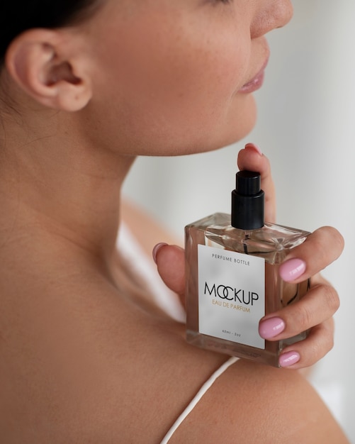 Woman with perfume mockup