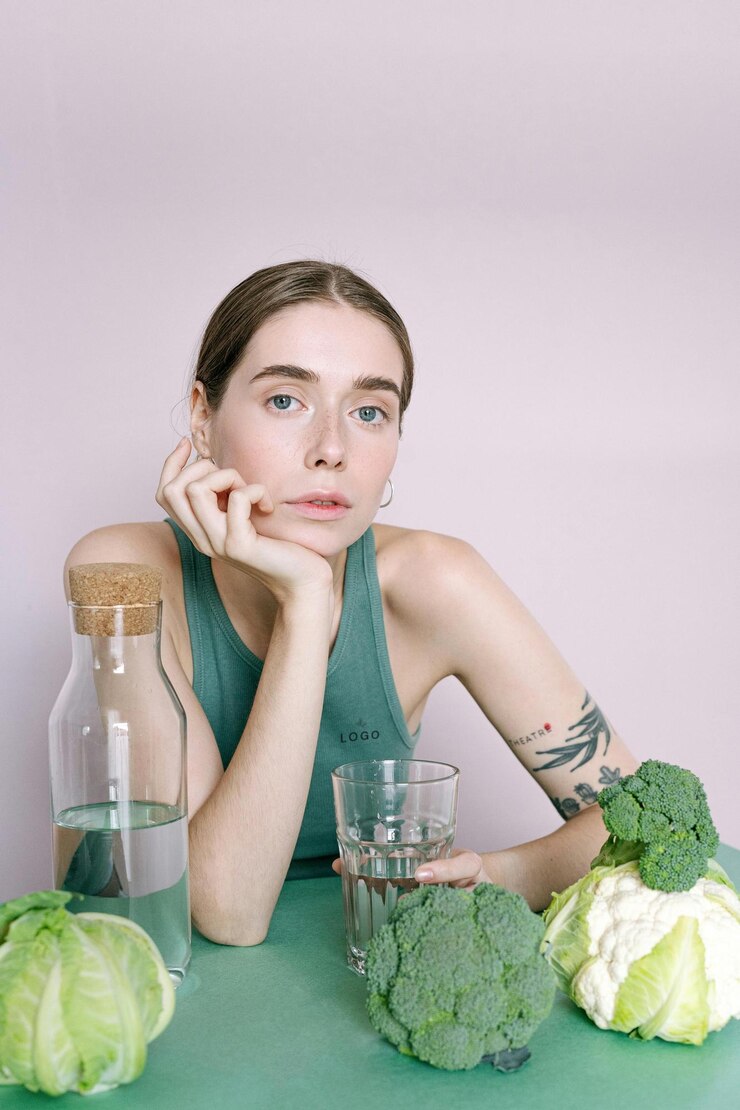 PSD woman with vegetables and water promoting healthy living