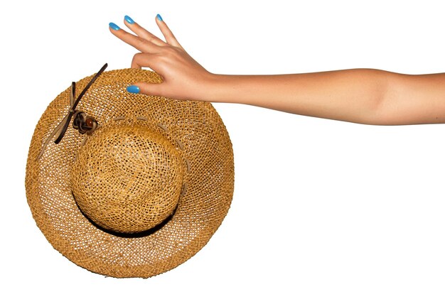 PSD a womans hand holds a straw hat on an empty background png