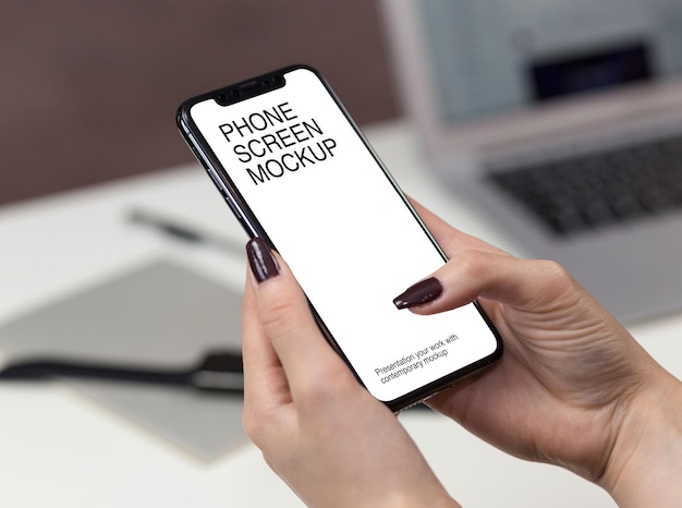 Women holding smartphone with screen mockup