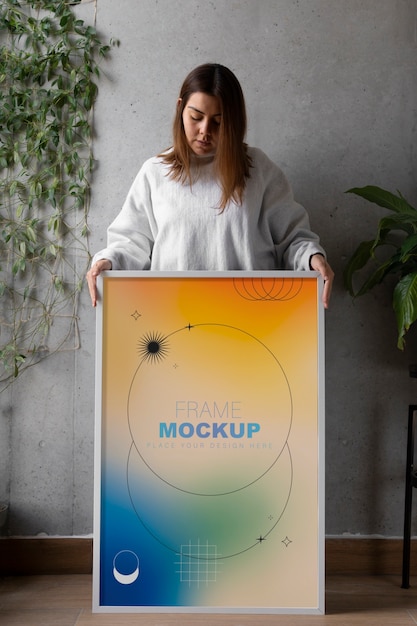 women indoors with white wall frame mock-up design