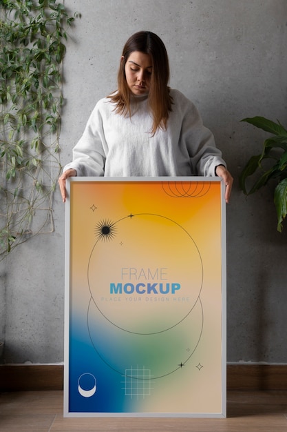 women indoors with white wall frame mock-up design
