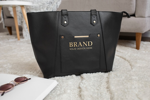 Women's bag embossed golden logo mock-up