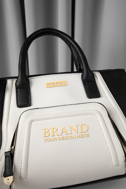 PSD women's bag embossed golden logo mock-up