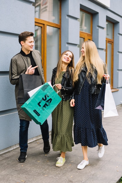 Women with shopping bags in city