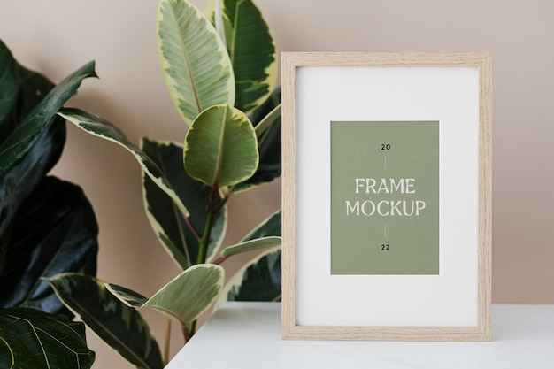 wood frame with plant mockup