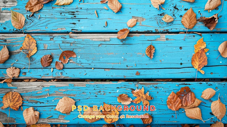 PSD wooden background with autumn leaves laying on it