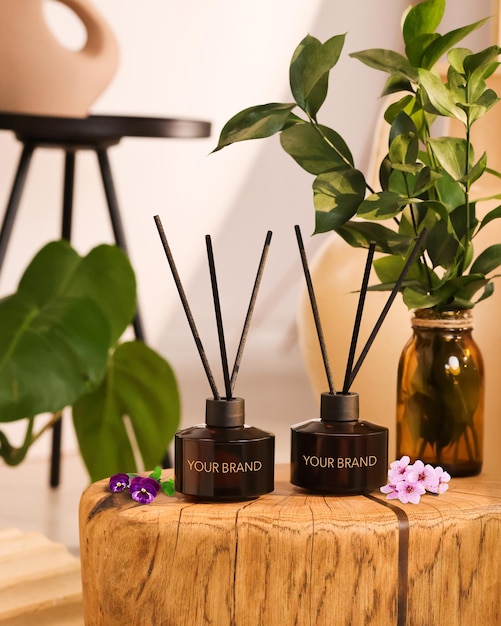 A wooden block with three aromatherapy diffusers on it.