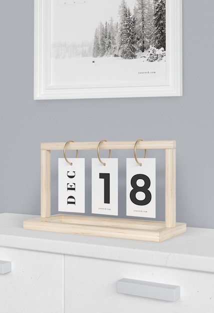 Wooden board with calendar numbers in tags